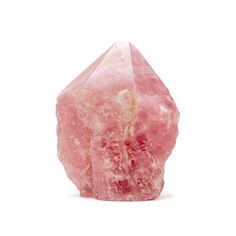 a pink rock on a white background