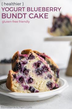 two slices of blueberry muffin on a white plate