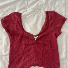 Red Baby Tee With Rose On Neckline. Purchased At Urban Outfitters. Never Worn. Cute V-neck Loungewear Tops, Red T-shirt For Spring Loungewear, Burgundy Cotton Short Sleeve Tops, Burgundy V-neck Top For Summer, Red Summer Loungewear Tops, Red Tops For Summer Loungewear, Red Casual Crop Top, Cute V-neck Tops For Loungewear, Cute Red V-neck Top