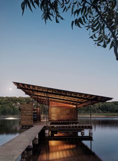 a wooden dock sitting next to a body of water