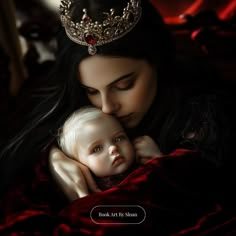 a woman holding a baby in her arms with a crown on top of her head