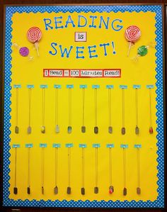 a bulletin board with lollipops and reading is sweet written on the front