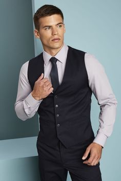 Fitted waistcoat    5 functioning buttons    Lined    We recommend washing this garment at 40°    Main: 82% Polyester, 18% Viscose    Lining: 100% Polyester    Length: 60cm/23.5in      If you require any more information about this product, or on our delivery and return policies, please consult our      FAQs      .            Quantity       1+     10+     20+          Price       £31.00     £29.45*     £27.90*              *Bulk-Buy discounted price will apply once products added to basket.    R Sleeveless Business Vest With Buttons, Business Sleeveless Vest With Buttons, Sleeveless Business Outerwear With Button Closure, Formal Blue Vest With Buttons, Sleeveless Business Blazer With Buttons, Tailored Business Vest With Button Closure, Fitted Waistcoat, Black Dress Shirt Men, Waistcoat Fashion