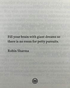 an open book with the words fill your brain with giant dreams so there is no room for petty pursuit