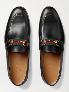 This version of Gucci's classic 'Brixton' loafers has collapsible heels, so they can be worn two different ways. Made in Italy from soft black leather, they're embellished with the house's signature green and red webbing and topped with burnished-gold horsebits borrowed from the original 1953 design. Gucci Loafers Men, Gucci Brixton, Leather Loafers For Men, Loafers Gucci, Shop Gucci, Gucci Collection, Gucci Men Shoes, Mens Leather Loafers, Classy Outfits Men