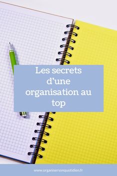 an open notebook with the words les secrets d'une organisation au top