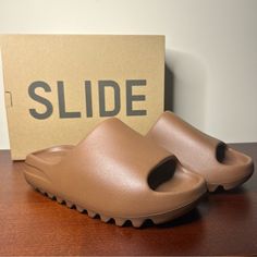 Yeezy Slide Flax (Size: 9) Size: 9 Men’s, Equivalent To A 10 Women’s *Adidas Yeezy Slide Is A Unisex Shoe, But Only Comes In Men’s Sizes. Description: The Adidas Yeezy Slide Flax Is A Slip On That Takes On A Minimalist Design And Is Available In A Monochromatic Finish In Dark Beige Or Flax Color. The Slide Flax By Yeezy For Adidas Is Made From Injected Eva Material, And The Sandal Takes The Shape Of A One-Piece Mold. The Construction Is Lightweight With Foam Compounds For Cushioning. The Same Ma Adidas Yeezy Slide, Yeezy Foams, Yeezy Slides, Mens Yeezy, Adidas Brand, Yeezy Shoes, Dark Beige, Unisex Shoes, Walker Boots