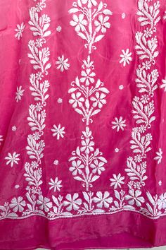 This crepe silk kurta in a soft, pink color is a stunning addition to your wardrobe. Adorned with intricate hand embroidery, it is a one-of-a-kind piece that is sure to turn heads. Complete the look with white straight pants and a white dupatta for a classic, traditional ensemble. 46" length Long sleeves 20" Round neck Crepe silk Side slits Dry clean Chikankari embroidery Hand embroidered Fit: True to sizeInside Margin: NoTouch and Feel: Soft and ComfortableDispatched in 1-3 business days Unstitched Pink Blouse Piece With Intricate Embroidery, Pink Anarkali Blouse Piece With Resham Embroidery, Pink Semi-stitched Blouse With Intricate Embroidery, Pink Long Sleeve Embroidered Fabric For Wedding, Pink Saree With Intricate Embroidery For Transitional Season, Transitional Pink Saree With Intricate Embroidery, Festive Pink Blouse Piece With Intricate Embroidery, Pink Embroidered Long Sleeve Fabric For Eid, Pink Georgette Kurta With Dabka Work