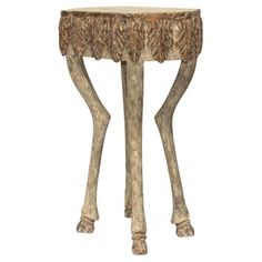 a wooden table with an animal's leg and legs on it, against a white background