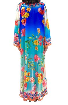 This light and airy duster is ready for tan lines and vacation vibes with its flowy longline silhouette and ombré flower print. 52" length (size OS)
 Open front Short sleeves 100% polyester
 Hand wash cold, lay flat to dry
 Imported Model stats: 5'10", 32" bust, 25" waist, 36" hip. Model is wearing size OS. Blue Floral Print Cover-up For Spring, Blue Floral Print Spring Cover-up, Spring Blue Floral Print Cover-up, Blue Floral Print Summer Cover-up, Blue Floral Print Cover-up, Blue Floral Print Beach Cover-up, Flowy Blue Cover-up With Floral Print, Spring Long Pool Cover-up, Long Spring Pool Cover-up