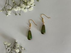 green Czech glass bead in teardrop shape with gold hardware Glass Beads Earrings, Green Teardrop Beaded Earrings With Dangling Beads, Green Teardrop Beaded Earrings For Gifts, Handmade Green Teardrop Earrings, Green Teardrop Drop Earrings For Jewelry Making, Gold Stone Earrings, Simple Dangle Earrings, Czech Glass Jewelry, Glass Bead Earrings