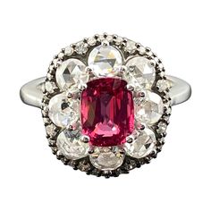 A stunning art-deco, vintage looking 1.53 carat natural Pink Spinel cushion shaped center stone, with 1.10 carat rose cut White Diamonds and 0.29 carat Diamonds set in solid 18K White Gold and black rhodium polish. Spinels has been frequently confused with ruby, but it’s a gem that can stand on its own merits. Many historically important red gems, long identified as ruby, were recognized as spinel in the 1800s. The ring is currently sized at US 6.5, and can be resized for no extra charge. Please 18k Gold Engagement Ring, Pink Spinel, Platinum Diamond Engagement Rings, Pink Tourmaline Ring, Modern Engagement Rings, Colorless Diamond, Emerald Engagement, Diamond Cocktail Rings, Platinum Engagement Rings