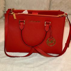 Brand New (Never Used), Beautiful Michael Kors Red Satchel. It Can Be Hand Held Or Used As A Cross Body. Had Many Compartments To Hold Your Belongings. Comes With A Dust Bag. Designer Red Shoulder Bag With Zipper Closure, Designer Red Shoulder Bag, Michael Kors Red Bag With Handles, Red Michael Kors Bag With Handles, Michael Kors Red Shoulder Bag With Detachable Strap, Red Michael Kors Shoulder Bag With Detachable Strap, Michael Kors Red Rectangular Shoulder Bag, Michael Kors Red Shoulder Bag For Shopping, Red Michael Kors Shoulder Bag For Shopping