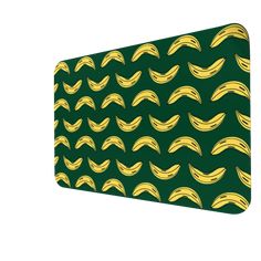 a green and yellow pattern with wavy lines on it's side, in the shape of a rectangle