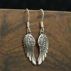 Silver Angel Wing Earring - Angel Wing Dangle Earring - 925 Sterling Silver Earring - Handmade Earring - Ear Wire Earring - Angel Wing Jewelry - Unique Silver Jewelry - Antique Silver Earring - Feather Earring - Gift For Her - Best Gift Jewelry. We accept customisation, contact us For Custom orders. Product Detail : Metal : 925 Sterling Silver Christmas Day Offer-Christmas Sale-Father's Day Gift-Mother's Day Gift-Christmas Gift-Wedding Jewelry-Birthstone Jewelry-Bridal Jewelry-Personalized Jewel Handmade Silver Wing-shaped Earrings, Wing-shaped Earrings For Gift, Wing-shaped Pierced Earrings As Gift, Wing-shaped Pierced Earrings For Gift, Silver Wing-shaped Earrings, Elegant Nickel-free Wing-shaped Jewelry, Handmade Silver Earrings, Angel Wings Jewelry, Sterling Silver Earrings Handmade