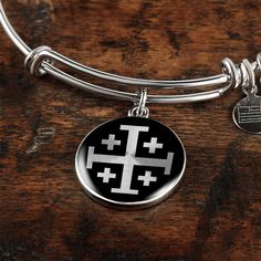 Do you love the Jerusalem cross? Purchase This Best-seller and We Guarantee It Will Exceed Your Highest Expectations! ➜ Our patent-pending jewelry is made of high quality surgical steel with an 18k gold finish option. ➜ Our jewelry is personalized in the U.S.A by awesome working moms just like yours! We hire and train working mothers and pay a living wage. We are proud to support strong communities and keep jobs in America! This Jewelry Item Is the Perfect Keepsake! Whether for Yourself or a Loved One. ➜ If the custom engraving option is available, engrave onto the back of the pendant your loved one's name, your wedding date, an anniversary, or anything else you want to remember and keep you close to her heart. Each personalized piece offers exceptional craftsmanship that is fit to be an i Symbolic Stainless Steel Cross Jewelry, Stainless Steel Cross Bracelets As Gifts, Stainless Steel Cross Bracelet As A Gift, Stainless Steel Cross Bracelet As Gift, Cross Shaped Stainless Steel Bracelet As Gift, Cross Shaped Stainless Steel Bracelet Gift, Engraved Adjustable Cross Pendant Jewelry, Adjustable Engraved Cross Pendant Jewelry, Nickel-free Stainless Steel Cross Jewelry