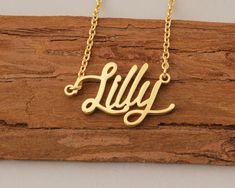 "Name Necklace, Custom Initial Necklace, Name Necklace Gold, Couples Necklace, Personalized Christmas Gift Necklace for Lilly This necklace is made of Stainless Steel Available color: Gold, Silver and Rose Gold Chain Length: 14\"16\"18\"20\"22\" inches Processing Time: 2-10 business days Standard Shipping: 10-15 business days to USA. 15-30 business days to other countries. Expedited Shipping: 5-8 business days to USA. 5-10 business days to others. Please do not hesitate to contact us with any co