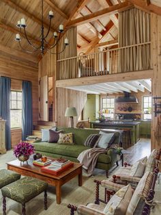 a living room filled with furniture and a fire place