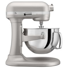 an image of a silver kitchen mixer on a white background with clippings to the side