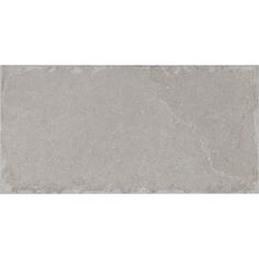 an image of a white marble tile with grey veining on the bottom and sides