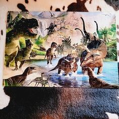 an image of dinosaurs in the wild