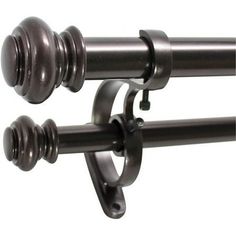 an image of two metal curtain rods