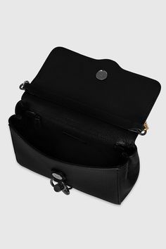 A new Megan has joined the family and she's going to become your new everyday go-to handbag. The new Megan Top Handle features a top handle, a detachable crossbody strap, and a chain shoulder strap, giving you extra versatility. Style #:CS24HMGXTH 100% Genuine Leather Black Shellac Hardware 8. 25" W X 6" H X 2. 75" D Strap Drop: 20. | Rebecca Minkoff Megan Top Handle With Chain Bag In Black Everyday Flap Bag With Branded Hardware And Double Handle, Everyday Double Handle Flap Bag With Branded Hardware, Classic Top Handle Shoulder Bag With Chain Strap, Classic Shoulder Bag With Chain Strap And Top Handle, Evening Satchel With Metal Hardware And Flap, Modern Flap Bag With Chain Strap And Top Handle, Everyday Satchel Flap Bag With Branded Hardware, Classic Everyday Satchel With Chain Strap, Leather Satchel With Chain Strap And Top Handle