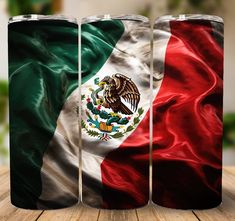 the flag of mexico is painted on three different colored metal cans, each with an eagle and two colors of red, white, and green