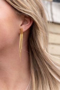 Our Tatiana Earrings, featuring a gold tassel dangle, are coming in hot, and they are going to be your new faves! They're ultra lightweight, so you can wear them all day and night without feeling weighed down - but trust us, they still pack a punch. You'll feel like you're walking down the runway every time you wear them. The playful tassel sways with every movement and adds just the right amount of flirtatious fun to your look.18k gold-plated stainless steelHypoallergenicTarnish resistantWaterp Long Gold Earrings, Light Weight Earrings, Stainless Steel Earrings, Day And Night, Winter Looks, In Hot, Dress To Impress, Plus Size Fashion, Feel Like