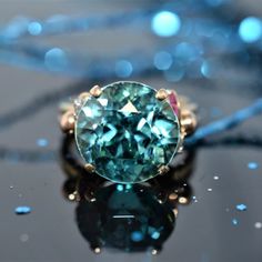 Luxury Blue Topaz Ring With Rose Cut Diamonds, Blue Emerald Ring With Round Cut, Blue Emerald Ring With Accent Stones, Ruby And Diamond Ring, Sparkly Jewelry, Royal Jewelry, Blue Zircon, Channel Set, Estate Jewelry