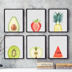 four framed pictures with different fruits and vegetables on them