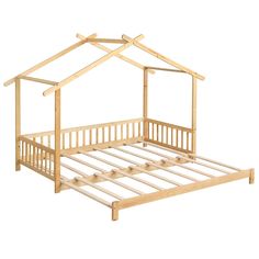 a wooden bed frame with a small house on top