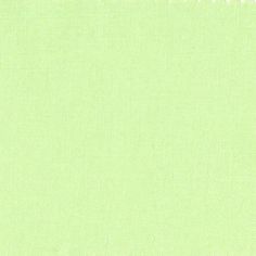 a green background with white stitching on it