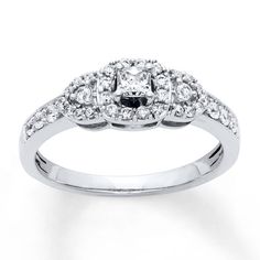 a white gold ring with diamonds on it