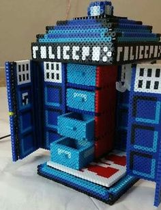 a blue and red building made out of legos