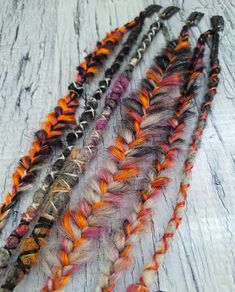 🎃 Ready to Ship! ~ Exactly as Photos! 🎃 4 Clips = 6 Extensions  Roughly 18"- 21" in length  Black & white ombre with splashes of purple & orange blends  Spooky Messy Braids & Dreads mixture! Messy style mixed braids with hints of wraps, infinity braids, fishtails, macrame, knots and dreads. Accented with artist's choice of lux fibers!  Unique textures, beads and sparkles make each one special in it's own way. Lift section of hair and snap open clip, slide into hair , snap closed, and then pull Dreads And Braids Together, Temporary Dreadlocks, Mixed Braids, Temporary Dreads, Infinity Braids, Faux Dreadlocks, Purple Dreads, Green Dreads, Messy Style