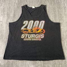 Vintage 2000s Sturgis South Dakota Motorcycle Biker Flames Biker Style Y2K Aesthetic Black Graphic Tank Top Shirt Extra Large Mens *V15 Condition:  Excellent Used Condition  = No Flaws Measurements: Please see photos above for all measurements IF YOU BUY TWO OR MORE ITEMS USE THE CODE BUNDLE @ CHECK TO SAVE 20% WE SHIP WITHIN 24 HOURS AFTER PURCHASE! Please be aware that we do not offer free returns!! The Buyer is responsible for the cost of the return label. Follow us on TikTok & Instagram @findsnostalgic and tag us in your finds Y2k Aesthetic Black, Sturgis South Dakota, Aesthetic Black, Vintage 2000s, Biker Style, Y2k Aesthetic, South Dakota, Black Aesthetic, Graphic Tank