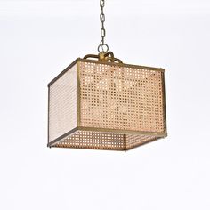 a light fixture hanging from a chain