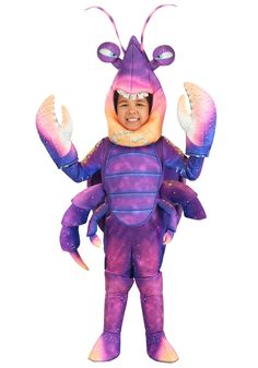 a man in a purple and blue costume holding a large crab on his back,