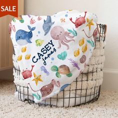 This personalized blanket is the perfect under the sea baby blanket, ocean animals toddler blanket, ocean baby shower gift, baby blanket with name, new baby gift, gift for niece, Christmas gift, underwater blanket, nautical baby gift. ❣️𝐃𝐄𝐓𝐀𝐈𝐋𝐒 * Velveteen microfiber lightweight blanket. * Sizes: 30"x40", 50"x60", 60"x80". * Single-sided print, white on reverse. * 100% Polyester. ✨𝐇𝐎𝐖 𝐓𝐎 𝐎𝐑𝐃𝐄𝐑 1. Select size 2. Select blanket color  3. For custom designs, input details in the "A Ocean Baby Showers, Picture Blanket, Swaddle Sets, Nautical Baby, Toddler Blanket, Lightweight Blanket, Personalized Blanket, Ocean Animals, New Baby Gift