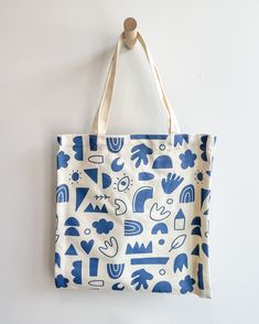 Need gift wrap? Want to add a super cool tote to your collection? We've got you covered. This print is designed by our friends at Earth Cadets. Each tote is 100% organic cotton. Totally washable AND re-usable. Measures approx. 15"x15".