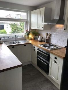 the kitchen is clean and ready for us to use in its new owner's home