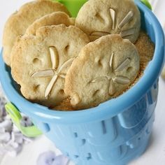 some cookies in a blue bowl on a table