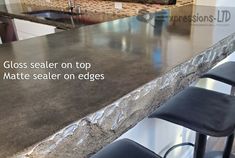 a metal counter top in a kitchen with chairs around it and the words glass sealer on top matte sealer on edges