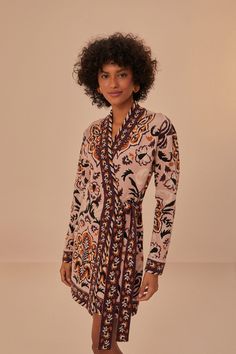 Embrace the artistic charm of the Glam Tapestry Knit Wrap Dress, a luxurious blend of cultural motifs and contemporary fashion. Its plush knit fabric is adorned with intricate tapestry patterns, radiating in warm hues of pink and brown for a rich visual feast. The flattering V neckline and tie waist highlight the silhouette, while the gentle wrap design provides a playful yet elegant movement with every step you take. Composition 30% POLYESTER 24% VISCOSE 24% POLYAMIDE 22% ACRYLICCare Instructions HAND WASH SEPARATELY, DO NOT BLEACH, DO NOT TUMBLE DRY, DRY FLAT, IRON AT LOW HEAT, DRY CLEAN WITH ANY SOLVENT EXCEPT TRICHLOROETHYLENESize and Fit Inches XXS XS S M L XL Bust 31 33 35 37 40 1/4 43 1/4 Waist 28 3/4 30 3/4 32 3/4 34 3/4 37 3/4 41 Length 31 2/4 32 32 3/4 33 1/4 33 3/4 34 2/4 Hip 33 Brazilian Clothes, Knit Wrap Dress, Pink And Brown, Belt Style, Knit Wrap, Farm Rio, Flat Iron, Clothing Dresses, Contemporary Fashion