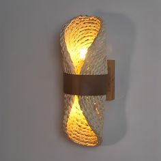 a light that is on the wall with some lights in it's corner,