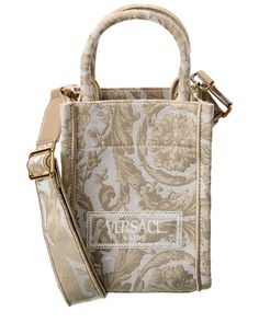 Price As Marked About The Brand: More Is More. Bold, Sexy & Glamorous Style From Italy. Made In Italy Barocco Athena Mini Canvas Tote In Beige Embroidered Canvas And Gold-Tone Hardware Interior Design Details: Canvas Interior Measures 7In Wide X 8.5In High X 4In Deep Top Handles Drop 4.5In Adjustable And Removable Shoulder Strap Drops 26In Open Top Please Note: All Measurements Were Taken By Hand And Are Approximate; Slight Variations May Occur. Our Products Are 100% Genuine. In Some Cases We Pu More Is More, Canvas Purse, Embroidered Canvas, Versace Bags, Glamorous Style, Mini Tote Bag, Pink Backpack, Prada Crossbody Bag, Mini Canvas