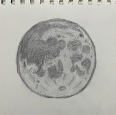 a pencil drawing of the moon on paper