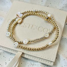 Bring a beachy charm to your look with our Personalised Shell & Pearl Bracelet Featuring shell lettering and heart, and a freshwater pearl, this bracelet is perfect for a meaningful and personalised gift for yourself or a special someone. Simply add up to four initials in the personalisation box. Due to natural materials each shell bead or pearl may vary in shape and size giving each bracelet its own unique quality Silver beads are 925 Stirling Silver Gold beads are Gold Filled (Tarnish free) Ea Adjustable Heart Bracelet With Pearl Charm As Gift, White Pearl Charm Bracelets For Valentine's Day, Valentine's Day White Bracelets With Pearl Charm, Elegant Letter Beads Bracelets For Beach, Amazon Account, Bracelet Initial, Initial Bracelet, Shell Beads, Colorful Bracelets