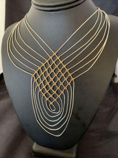 * The Necklace has beautiful Sterling Silver Heishi beads and Gold Filled Beads Cascading down and strung in 7 Strands, With a unique design it adds a Gorgeous Style to the Necklace. * Length 18" drops down to 28" * Strands 7 * Made in USA   Free Returns or Replacements within 30 Days of Purchase with tags intact. Please let us know the problem before posting a bad feedback. Fast, Free and Guaranteed Shipping Please contact seller for any questions and concerns. We hope you have a great experience with us and hope for an awesome review. Unique Multi-strand Jewelry With Spacer Beads, Elegant Adjustable Beaded Chain Bib Necklaces, Elegant Adjustable Bib Necklace With Beaded Chain, Bohemian Gold Bridal Necklace With Polished Beads, Unique Multi-strand Necklaces With Spacer Beads, Unique Multi-strand Necklace With Spacer Beads, Luxury Multi-strand Beaded Jewelry, Luxury Silver Beaded Necklaces, Luxury Handmade Adjustable Necklace